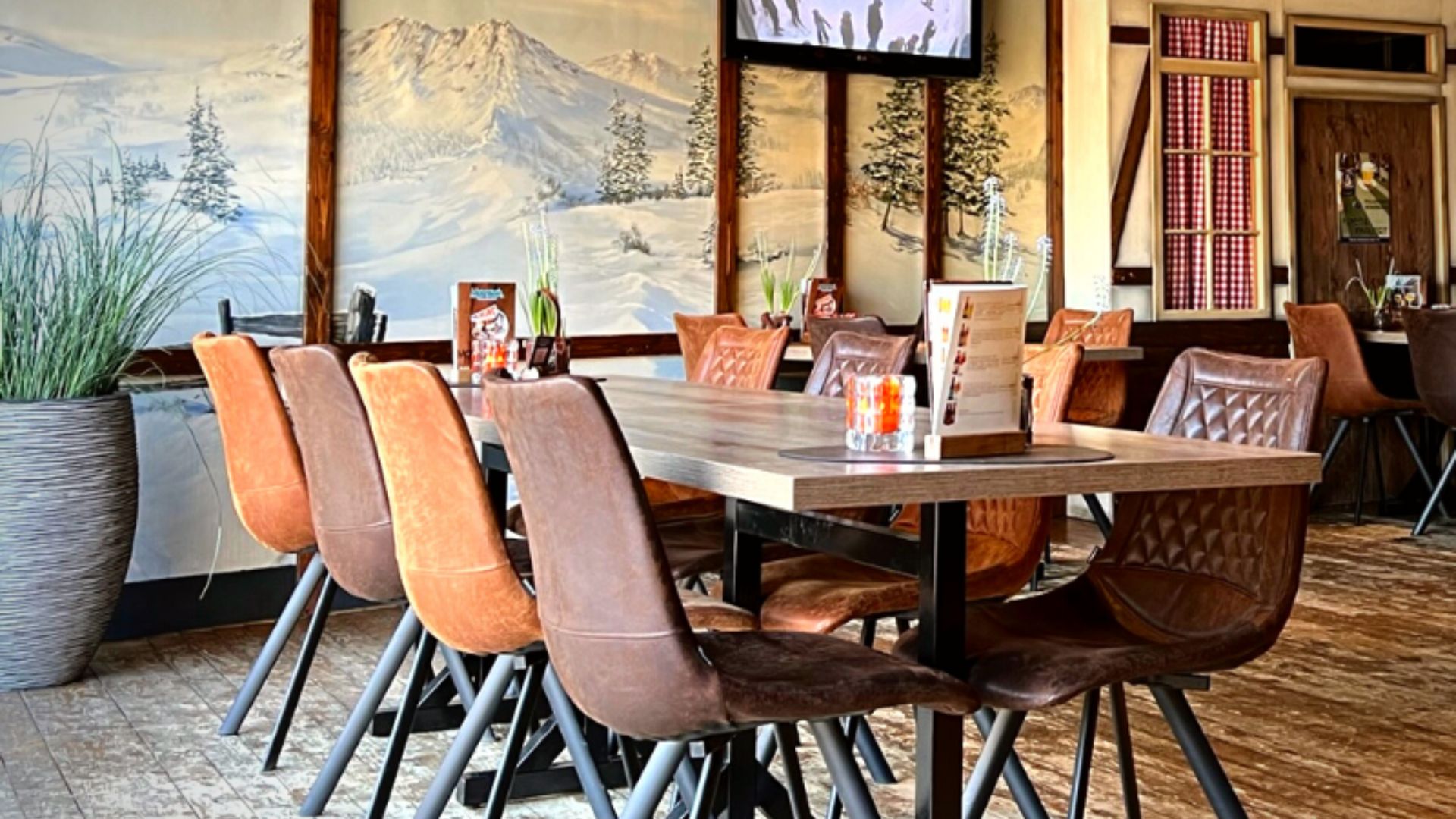 Restaurant van Montana Snowcenter met uitzicht op de piste